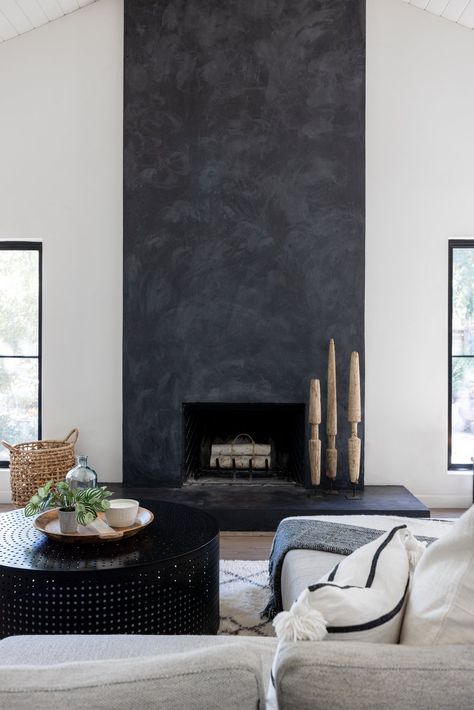 Black Concrete Fireplace Surround, Limewash Black Fireplace, Dark Stucco Fireplace, Black Painted Fireplace Wall, Black Metal Fireplace Surround, Cement Looking Fireplace, Dark Concrete Fireplace, Black Soapstone Fireplace, Grey Plaster Fireplace