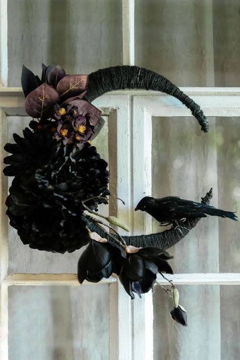 Haunt your chamber door with a DIY crescent moon wreath that’s sure to set a tone of terror. Crescent Moon Wreath Diy, Moon Wreath Diy, Crescent Moon Wreath, Moon Wreath, Halloween Door Wreaths, Moon Crafts, Wire Wreath Forms, Diy Halloween Wreath, Halloween Moon