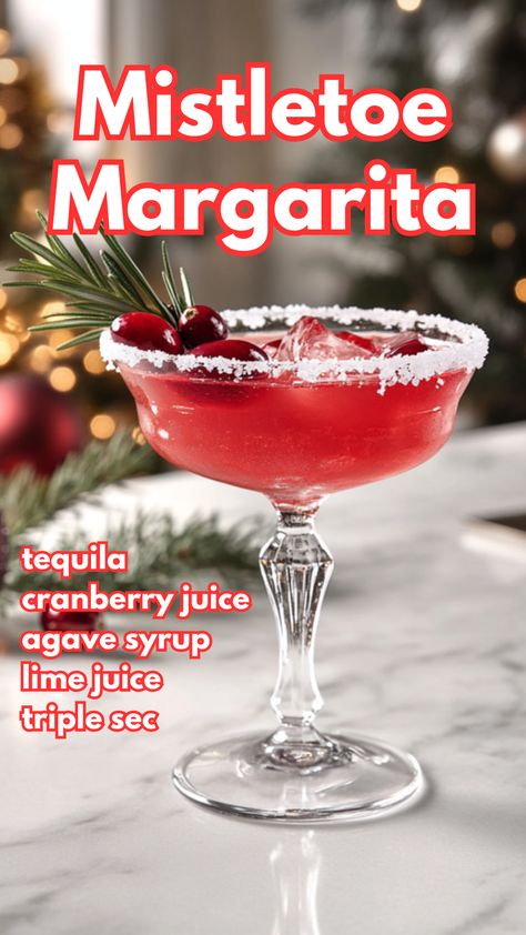 The Mistletoe Margarita is a festive twist on the classic cocktail, blending the tangy flavors of lime and cranberry with smooth tequila and a hint of orange. Topped with fresh cranberries and a fragrant sprig of rosemary, this holiday drink is as festive as it is refreshing.  #mistletoemargarita #christmascocktails via @mybartender Holiday Drinks With Tequila, Mistletoe Cocktail, Tequila Cocktails Recipes, Christmas Margaritas, Mistletoe Margarita, Pitcher Margarita Recipe, Holiday Margaritas, Holiday Drinks Alcohol, Themed Cocktails