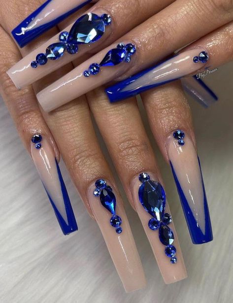 Blue rhinestone nails Royal Blue Nails Diamonds, Fake Nails With Rhinestones, Fancy Rhinestone Nails, Blue Long Nails With Gems, Navy Nails With Rhinestones, Acrylic Nails Blue Rhinestones, Navy Blue Rhinestone Nails, White Nails Blue Rhinestone, Blue Nails With Diamonds Rhinestones