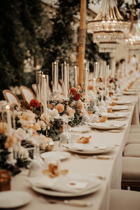 Boho chic meets rustic in the Tuscan countryside. Imperial table at the foot of the main villa at Il Borro complete witch chandeliers, beautiful pastel colours, candles, so dreamy.. Italian aesthetic Wedding photographer: Alberto Gobbato Wedding venue: Il Borro in Tuscany Tuscan Wedding Theme Rustic Italian Table Decorations, Imperial Wedding Table, Fall Italian Wedding Colors, Fall Wedding Sweetheart Table Decor, Fall Tuscan Wedding, Tuscan Wedding Table Setting, Italian Aesthetic Wedding, Tuscan Wedding Decor, Event Tablescapes