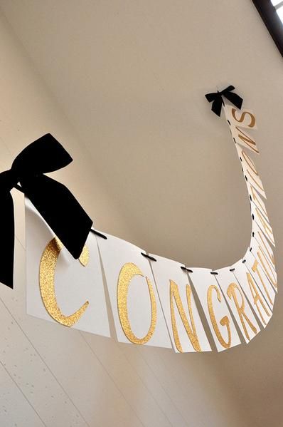 This Confetti Momma "Graduation Banner" is so irresistible. It can be such a chic party focal point for your graduation party. You could hang one on your mantle, drape one behind the snack table, or use it as a party photo prop!This banner was designed using sophisticated glitter gold font, white card stock tiles, and Party Graduation Decorations, Congratulations Graduation, Anniversaire Diy, College Graduation Parties, Graduation Signs, High School Graduation Party, Grad Party Ideas, Graduation Banner, Snack Table