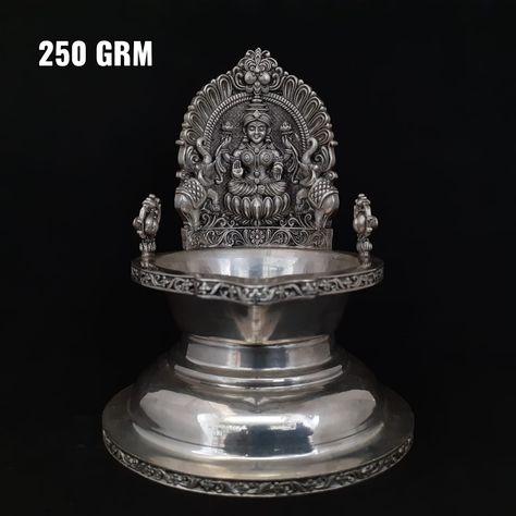 Silver pooja items can be bought either in a set or can be picked individually based on the need. Here are the common silver pooja items that are extensively used on a daily basis Buying silver pooja item sets is advantages in terms of uniformity. Silver pooja item sets ideally include silver lamps for pooja, silver plates; silver bowls etc., the uniformity in design makes gives them an ideal look. Not just pooja items, silver is also popularly used in making Jewelry. Silver Jewelry sets go well Silver Plates For Pooja, Silver Pooja Items Set, Silver Diyas For Pooja, Antique Silver Pooja Items, Silver Gift Items For Wedding, Silver Lamps For Pooja, Goddess Tripurasundari, Silver Items For Pooja, Silver Lamps