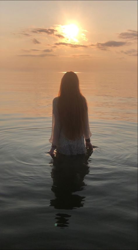 Wading Through Water, Metamorphosis Photoshoot, Person Standing In Water, Singles Poses, Hopeful Painting, Drowned Aesthetic, Woman Standing In Water, Washed Up On Shore, Aphrodite Dress