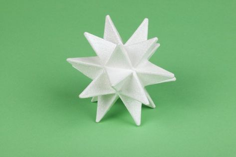 The multiple-point Moravian star, popularized in Germany in the mid-1850s, is a symbol of Advent and Christmas for the Moravian Church. However, the paper craft Moravian star, also known as a Froebel star, was invented by kindergarten founder Friedrich Froebel as a tool to teach math concepts to children. Folded Paper Stars, Moravian Star, Dollar Bill Origami, Origami Star, Paper Christmas Decorations, Star Ornaments, Beautiful Christmas Decorations, Folded Paper, Paper Boxes