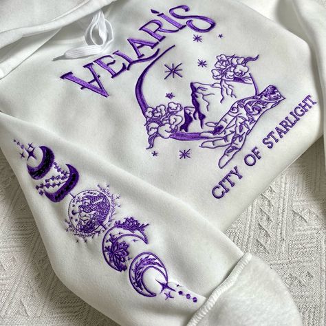 To all ACOTAR fans 🌌✨ This embroidered hoodie was made just for you 😍 Wear your love for the series with pride! 🤩 ✨ Exquisite embroidery details🧵 ✨ Impressive design🪡 ✨ Perfect for every book lover 📚 #bookstagram #bookish #booklover #acotar #acotarseries #velaris #velariscityofstarlight Acotar Crochet, Embroidered Hoodie, Embroidery Details, Book Lover, Book Lovers, Embroidery, Sweatshirts, T Shirt, How To Wear