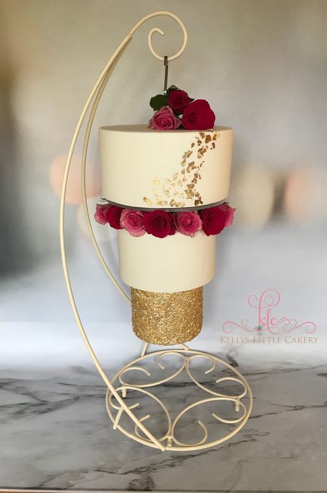 An upside down, hanging chandelier wedding cake! I call it..... The Maisy after my own daughter who is unique, and upside down at times! 😆 Upside Down Wedding Cake, Hanging Cake Wedding, Gravity Wedding Cake Ideas, Wedding Cake Hanging From Ceiling, Engagement Cake Designs Unique, Chandelier Cake Upside Down, Gravity Defying Wedding Cake, Suspended Wedding Cake, Wedding Cake Chandelier