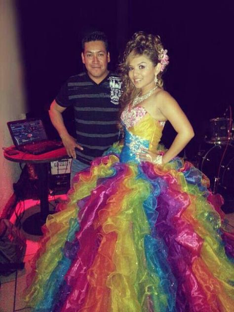 I love this quincenera dress!! My dream quincenera dress I was not hopeing for a 15 party but with dress in the world I am exited!!!!! Rainbow Quince Dress, Rainbow Quinceanera Dresses, Quincenera Dress, Rainbowcore Fashion, 2000s Dresses, Bling Outfits, Rainbow Wedding Dress, Rainbow Dresses, Fancy Gown