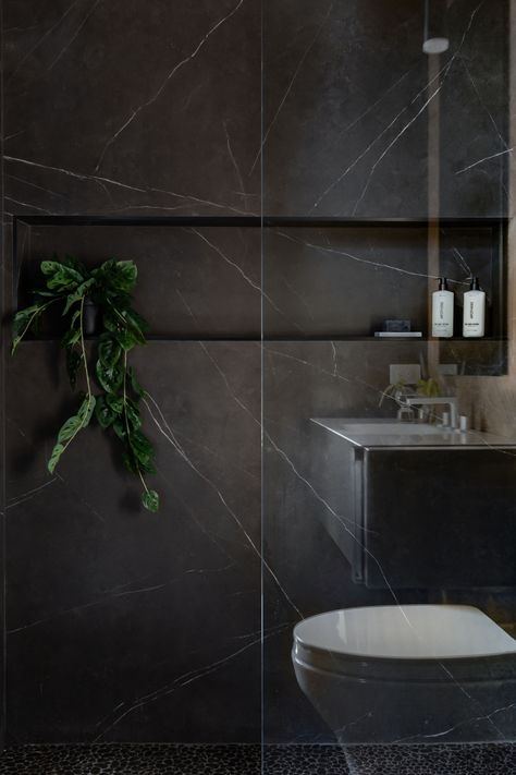 Dark Bathroom Esthetic, Dark Grey Moody Bathroom, Dark Tile Ensuite, Monochromatic Tile Bathroom, Dark Bathroom Interior Design, Dark Relaxing Bathroom, Dark Bathroom With Plants, Dark Masculine Bathroom, Dark Tiles In Bathroom