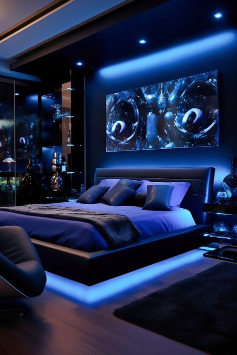 Luxurious modern bedroom in deep black and cobalt blue, featuring a queen-size platform bed, cobalt blue armchair, and spotlighting. Cobalt Blue Bedrooms, Midnight Blue Bedroom, Black Modern Bedroom, Luxurious Modern Bedrooms, Dark Blue Bedrooms, Home Bedroom Design, Minimalist Bed, Luxury Bedroom Design, Modern Bedroom Design