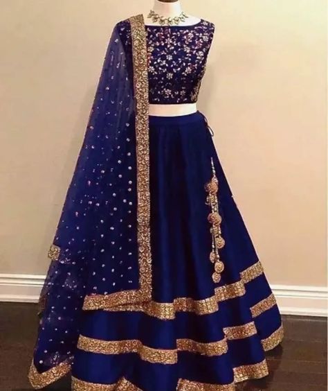 "Turn heads with our Navy Blue Taffeta Silk Lehenga Choli! 💙 This stunning semi-stitched lehenga, crafted from luxurious taffeta silk, is perfect for making a statement at any occasion. With a waist size of 42-44 inches and a bust size of 38-42 inches, it offers the perfect fit for graceful elegance. #LehengaCholi #TaffetaSilk #NavyBlueLehenga #EthnicFashion #FestiveWear #WomenStyle ✨ Shop now at www.crozsi.com and dazzle in this timeless beauty!" Navy Blue Lehenga, Silk Lehenga Choli, Silk Lehenga, Lehenga Choli, Ethnic Fashion, Festival Wear, Waist Size, Timeless Beauty, Lehenga