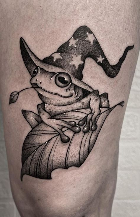 100 Ribbiting Frog Tattoo Designs, Ideas, and Meanings - Tattoo Me Now Animal Ghost Tattoo, Weird Frog Tattoo, Frog And Bee Tattoo, Frog With Wizard Hat Tattoo, Gothic Frog Tattoo, Wizard Toad Tattoo, Trippy Frog Tattoo Ideas, Magic Frog Tattoo, Spooky Frog Tattoo