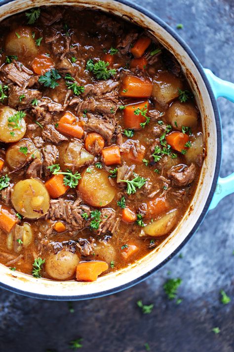 This Guinness Beef Stew recipe is made on the stovetop in a Dutch oven and packed with flavour. Whip up a batch for St. Patrick's Day or any day you're craving a delicious bowl of comfort food! Beef Stew In The Oven, Guiness Beef Stew Recipe, Stew In The Oven, Dutch Oven Beef Stew Recipes, Guiness Stew, Guinness Stew Recipe, Beef Stew Recipe Oven, Irish Beef Stew Recipe, Dutch Oven Soup