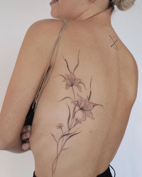 Wrap Around Tattoo Back, Sleek Tattoos For Women, Peony Tattoo On Back, Asian Lily Tattoo, Self Love Back Tattoo, Delicate Floral Back Tattoo, Shoulder Back Flower Tattoo, Back Red Tattoo, Peony Back Tattoo