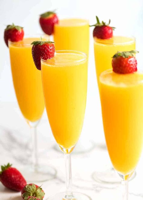 Champagne flutes filled with Mimosas Champagne And Orange Juice Mimosas, How To Make Mimosas Recipes Orange Juice, How To Make A Mimosa Orange Juice, Orange Juice And Champagne Mimosas, Champagne For Mimosa, Champagne And Orange Juice, How To Make Mimosas, Christmas Mimosas, Mimosa Cocktail Recipes