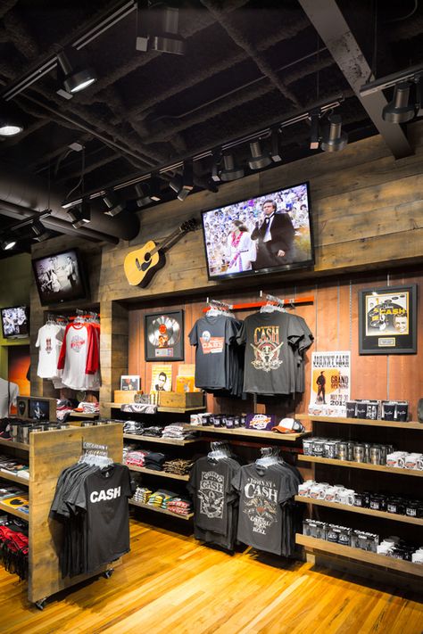 Make gift shop merchandise pop with LED trac lighting Merchandise Display Ideas, Small Shop Interior, Brewery Interior, Tattoo Shop Decor, Visual Merchandising Fashion, Gift Shop Displays, Hiking Store, Store Shelves Design, Brewery Design