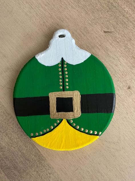 Homemade Wooden Ornaments Diy Christmas, Cute Wood Ornament Ideas, Ornament Painting Ideas Canvases, Christmas Paintings On Ornaments, Movie Christmas Ornaments, Diy Round Wooden Christmas Ornaments, How To Paint Wooden Christmas Ornaments, Elf Wood Slice Ornament, Wood Ornament Decorating Ideas