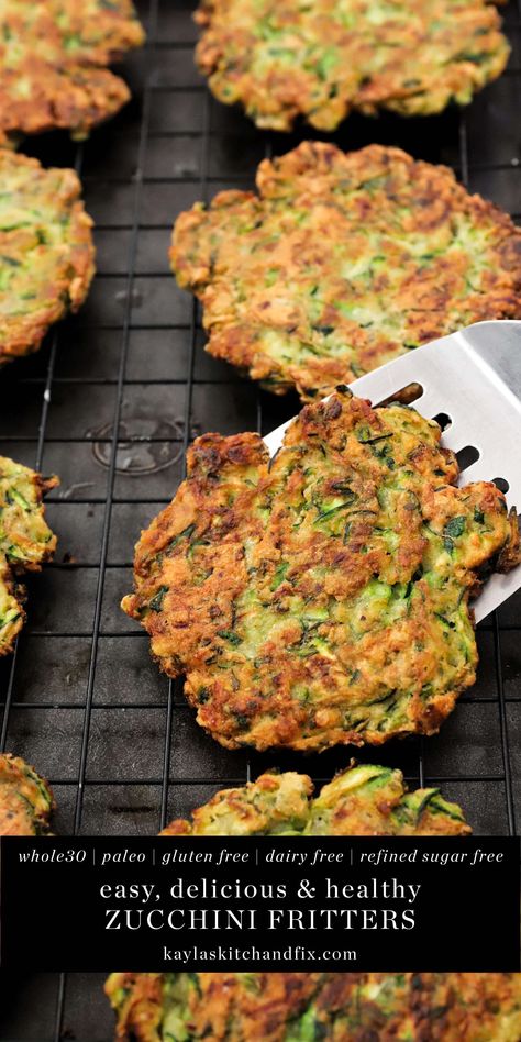 Each bite of these easy to make Paleo Zucchini Fritters is crispy and packed with delicious nutrients. They only require a handful of ingredients and require less than 30 minutes of your time. Paleo Veggie Fritters, Aip Zucchini Recipes, Zucchini Fritters Paleo, Zucchini Ricotta Fritters, Healthy Fritters, Paleo Zucchini Recipes, Gut Foods, Baked Zucchini Fritters, Pesto Aioli