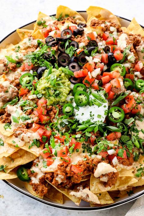 Loaded Ground Beef Nachos - Carlsbad Cravings Ground Beef For Nachos Recipes, Ground Beef Nachos, Loaded Nachos Recipe, Homemade Nacho Cheese Sauce, Nachos Cheese Recipe, Nachos Recipe Beef, Homemade Nachos, Carlsbad Cravings, Loaded Nachos