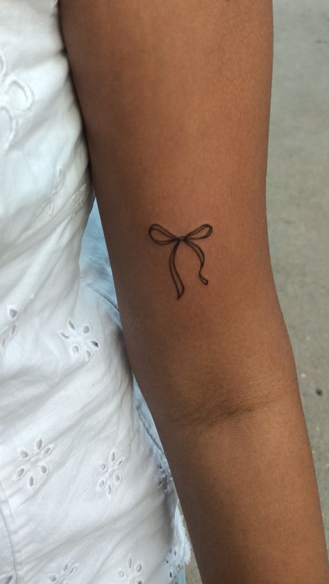 Simple Tattoos On Hip, Small Cute Arm Tattoos, Small Patchwork Tattoos Women, Dainty Patch Work Tattoos, Tattoos Woman Aesthetic, Cute Bow Tattoos Girly, Minimalist Bow Tattoo, Unique Women’s Tattoos, Bow Tattoo Back Of Arm