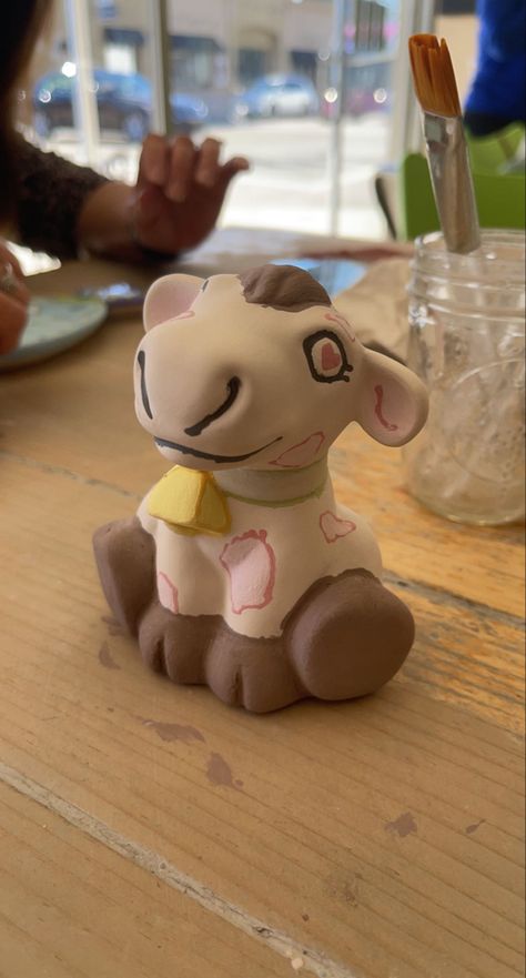 Soft pastels on a ceramic cow using paints and pottery Cow Pottery Painting, Pottery Painting Aesthetic, Cow Pottery, Painting Aesthetic, Cute Cow, Paint Palette, Cute Cows, Pottery Painting, Cow Print