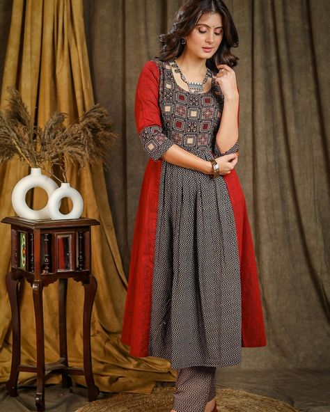 This A-Line Cotton Ajrakh Combination Kurta features gathers in the front and a matching pant option. Made with premium quality cotton, it offers a comfortable and stylish option for any occasion. The traditional Ajrakh print adds a touch of cultural heritage to your wardrobe. #sujatra #sujatraglobal #sujatrakurtis #cottonkurti #alinekurti #ajrakh #cottonajrakh #ajrakhkurti #cottonpants Printed Kurti Designs, A Line Kurti, Kurti Pant, Kurtis With Pants, Printed Kurti, Cultural Heritage, Cotton Pants, Kurti Designs, Indian Dresses