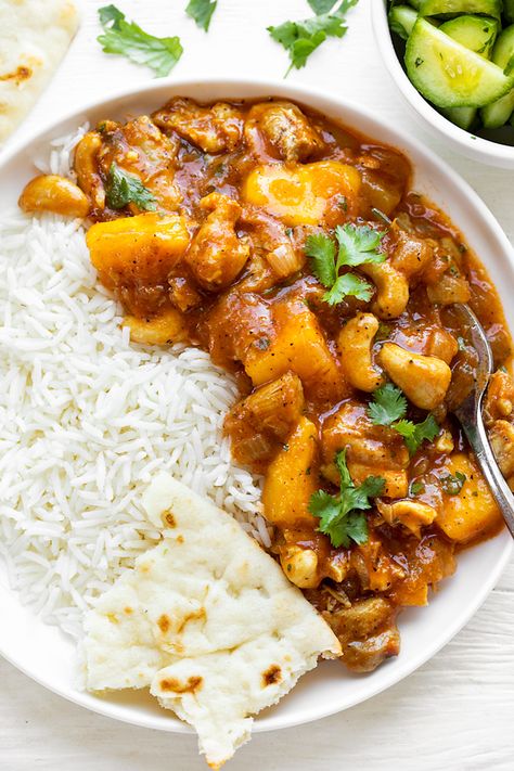 This mango chicken is bursting with fresh mango for sweet-savory flavor, and kissed with curry, cinnamon and ginger for a mildly spicy kick! | thecozyapron.com #mangochicken #mangochickenrecipes Meals With Mango, Pork Mango Recipes, Mango Chicken Recipes Easy, Chicken And Mango Recipes, Savory Mango Recipes, Chicken Mango Recipes, Exotic Dinner Recipes, Mango Meals, Indian Mango Chicken