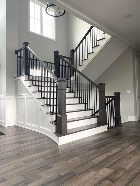 Grey Stair Railing, Black Stair Case Ideas, Dark Staircase Light Floors, Black Staircase Light Floors, Dark Floor Entryway, Grey Wood Staircase, Updated Staircase Ideas, Light Floors Dark Stairs, Light Wood Floors Dark Stairs