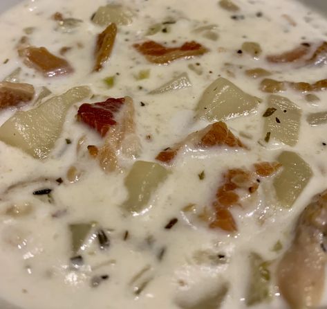 So Delish!  Make it today! Ingredients 1 can cream of mushroom soup 4 medium potatoes, peeled and diced 2 stalks of celery, diced 5 cloves of garlic, pressed or minced 1 medium onion, diced 7 strips of thick bacon, cooked and diced (I make it in the oven; 375 degrees; 15-20 minutes) 1 1/2 teaspoons dried basil 1 1/2 teaspoons dried thyme 2 bay leaves Salt and pepper, to taste 4 (6 1/2 ounce) cans chopped clams (including juice) 2 cups heavy cream (or half and half if for a lighter chowder) 1 c Clam Chowder Recipe Crock Pot, Clam Chowder New England, Best Clam Chowder Recipe, Clam Chowder Recipe, New England Clam Chowder, Chowder Recipes Seafood, Crock Pot Recipe, Crock Pots, Chowder Soup