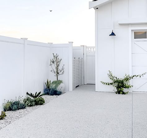 Hamptons Style Garden Landscaping, Colourbond Surfmist, Coastal Driveway Ideas, Coastal Driveway Landscaping, Hampton Driveway, White Driveway, White Colorbond Fence, Hamptons Driveway, Coastal Driveway