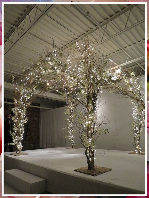 Looking to create a magical winter wedding? These 10 stunning winter wedding arch ideas will take your celebration to the next level. From elegant evergreen branches to delicate snowflake accents, find inspiration for your dreamy winter wedding arch. Whether you're going for a rustic or glamorous theme, these ideas will make your special day truly unforgettable. Get ready to say "I do" in style with these enchanting winter wedding arch designs. Wedding Tree Decorations Indoor, Fairy Wedding Arch, Lighted Trees For Wedding, Wedding Atelier Interior, Bridal Branding, Whimsical Wedding Decor, Winter Wedding Arch, Light Arch, Fairy Lighting