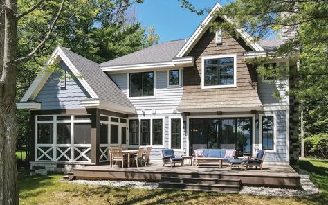 Inside a Timeless Northern Michigan Cottage on Lake Skegemog Michigan Lake House, Cottage On Lake, Michigan Cottage, Window Reveal, Home Cottage, Luxurious Showers, White Oak Floors, Lake Living, Island With Seating