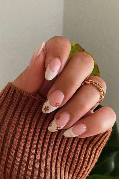 27 Cute Fall Nails and Fall Nail Colors You Have To Try in 2023 - Its Claudia G Brown Nails White Flowers, Fall Nail Inspiration Autumn Almond, Heart Art Nails, Fall Nail Inspo Almond Short, Short Nail Inspo Autumn, Dainty Fall Nails, Cute Simple Fall Nails, September Nails Almond, Fall Acrylic Nails Almond