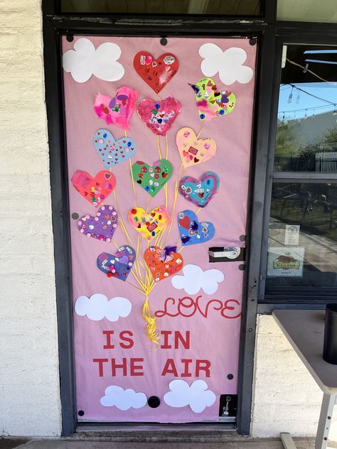 Love Is In The Air Door Decoration, Friendship Classroom Door, Valentine’s Classroom Door, Classroom Door Ideas Valentines Day, Love Is In The Air Bulletin Board, Valentine Bulletin Board Ideas Preschool, Valentine’s Day Classroom Door, Valentines Kindergarten, Valentines Door Decorations Classroom