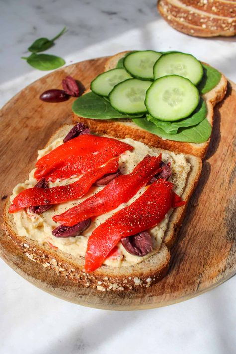 Mediterranean Veggie Sandwich With Hummus Mediterranean Veggie Sandwich, Sandwich With Hummus, Hummus Sandwich, Veggie Sandwich, Whole Wheat Bread, Piece Of Bread, Kalamata Olives, Roasted Red Peppers, Baby Spinach