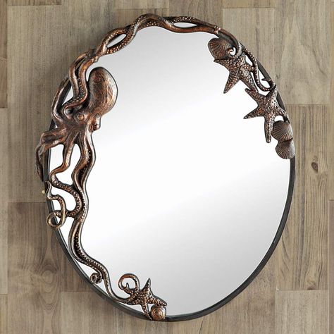 PRICES MAY VARY. 60 Day No Hassle Returns Exclusive - Cast iron sculptural details in a bronze finish. This coastal mirror measures 21 1/2"W x 2"D x 26"H. Coastal Mirrors, Octopus Decor, Mermaid Bathroom, Farmhouse Side Table, Coastal Bedrooms, Oval Wall Mirror, Length Mirror, A Mirror, Wall Mirrors