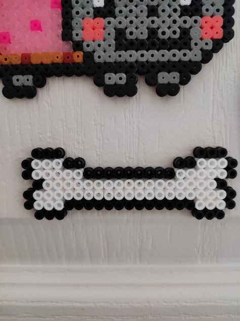 bone of the famous dog perler bead 🤍 Dog Perler Bead, Hammer Beads, Famous Dogs, Beads Ideas, Dog Bone, Perler Bead, Doberman, Perler Beads, Rock Painting