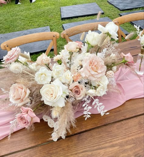 Pink And Pampas Wedding, Boho Pink Centerpieces, Boho Floral Arrangements Table Settings, Pink Boho Centerpieces, Floral Baby Shower Centerpieces, Baby In Bloom Centerpiece Ideas, Pink Party Tables, Pumpkin Theme Baby Shower, Boho Centerpiece