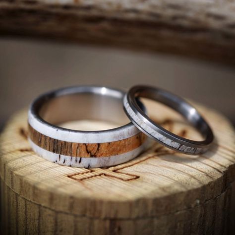 Product Details Ring Style: Matching wedding band set featuring ahandcrafted men's wide weddingband withspalted maple and antler. "Eterna" is a stacking-style wedding band featuring an antler inlay. Width:The width of the men's ring pictured is approximately 7-8mm wide and the women's ring is 2-3mm wide. If you prefer the ring in a larger width, there is a small upgrade cost, however, once your order has been placed we can reach out to you for payment. Please state your desired width in the Note Elk Antler Wedding Band, Matching Wedding Band Sets, Antler Wedding Rings, Matching Wedding Ring Sets, Stunning Wedding Rings, Antler Wedding Band, Simple Wedding Rings, Big Wedding Rings, Antler Wedding