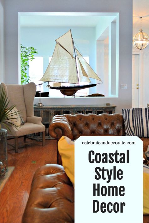 coastal living room with text overlay coastal style home decor Nautical Sitting Room, Dark Leather Couch Coastal Living Room, Cozy Nautical Living Room, Coastal Decor With Dark Wood Furniture, Dark Wood Coastal Decor, Dark Nautical Decor, Coastal Living Rooms With Dark Wood, Nautical Furniture, Tufted Leather Sofa