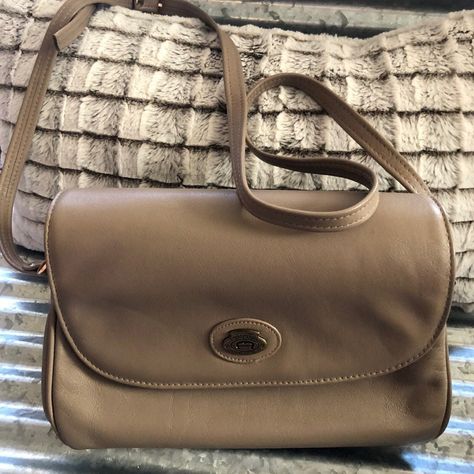 original Etienne Aigner handcrafted Taupe Purse
Gold hardware
Adjustable shoulder and crossbody strap
4 compartments inside 
Back pocket
Excellent condition
Very clean inside and out 
11”x8”x4”
Pretty taupe leather