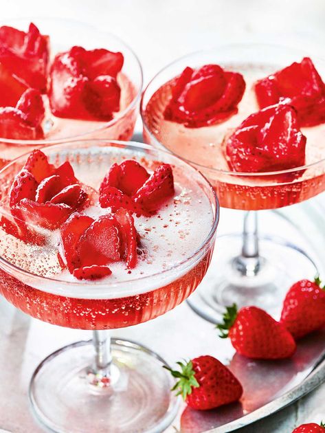 Strawberry rose spritz recipe  | Sainsbury`s Magazine Strawberry Rose Cocktail, Strawberry Rose Ice Cube, Rose Strawberries, Wimbledon Recipes, Xmas Cocktails, Rose Spritz, Magazine Recipe, Fruity Cocktail, Strawberry Rose