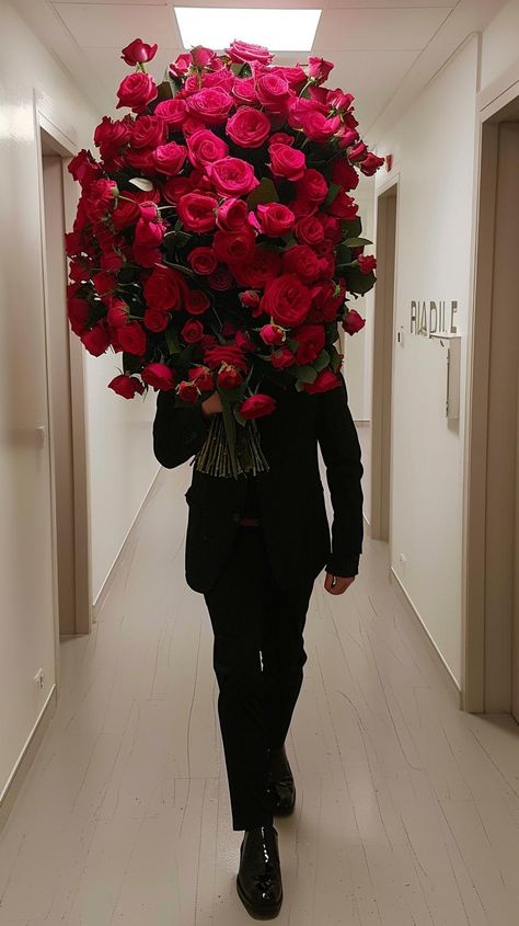 Discover the essence of elegance with this captivating scene— a figure dressed in a sleek black suit takes a stroll, arms cradling a massive bouquet of lush red roses, masking their identity. This portrayal of mystery and romance invites you to dive deeper. Save and follow for more glimpses into beauty. 🌹✨ #EleganceInMystery #RedRoseBouquet #BlackSuitElegance #MysteriousBeauty #FollowForMore #SaveThisBeauty #AIimage Roses Surprise, Autumn Leaves Wallpaper, Figure Dress, Romantic Surprise, Money Motivation, Red Rose Bouquet, Leaves Wallpaper, Black Suit, A Lady