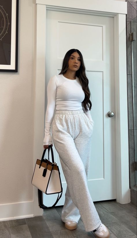 Grey high waisted wide leg sweatpants, long sleeve ribbed tee, tote bag, adidas sambae platform sneaker. #petitefashion #chicstyle #comfyoutfit #ootd #outfitideas #stylingtips #whattowear #casualootd #adidassambas White Sweat Set Outfit, Sweatpants Long Sleeve Outfit, Long Sweatpants Outfit, Plain Jane Outfits, Sweat Pants Gym Outfits, Simple Spring Work Outfits, Sweatpants Outfit Wide Leg, Oatmeal Pants Outfit, Long Sleeve With Sweatpants