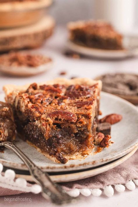 This bourbon chocolate pecan pie has crunchy pecans and gooey chocolate wrapped in a buttery bourbon-spiked filling. A Southern favorite! #chocolate #bourbon #pecanpie Pecan Pie With Bourbon, Bourbon Chocolate Pecan Pie, Raspberry Shortbread Bars, Walkers Shortbread Cookies, Chocolate Bourbon Pecan Pie, Bourbon Chocolate, Walkers Shortbread, Bourbon Pecan Pie, Pecan Pie Easy