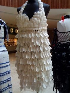 Recently at the Hospice d’Havré near Lille, France, an exposition entitled “The Dress: A Plastic Object” showcased dresses made from unusual materials, such as plastic spoons (sho… Weird Dresses, Anything But Clothes, Recycled Costumes, Plastic Spoon Crafts, Recycle Fashion, Junk Kouture, Trash Fashion, Unconventional Fashion, Dresses Materials