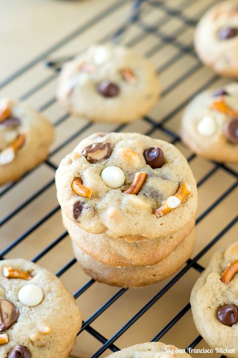 A recipe for reindeer tracks cookies, made with mini peanut butter cups, pretzels, white and milk chocolate chips. Reindeer Tracks, Mini Peanut Butter Cups, Spritz Cookies, Gourmet Cookies, Cream Cheese Recipes, Vintage Cookies, Milk Chocolate Chips, Oatmeal Cookies, Peanut Butter Cups