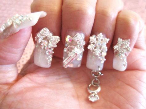 My crazy custom nails with Swarovski crystals and a diamond ring dangle hanging from a pierced nail. Nails With Hanging Charms, Nails With Charms, Nail Piercing, Custom Nails, Kiss Nails, Cool Piercings, Hole Puncher, Nail Ring, Super Kawaii