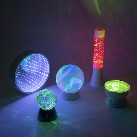 A dynamic sensory light kit for children 3 years and up, fostering a tranquil and engaging space. Glitter Lamp, Infinity Lights, Special Needs Toys, Sensory Lights, Sensory Rooms, Calming Sounds, Classroom Storage, Sensory Room, Paint Storage