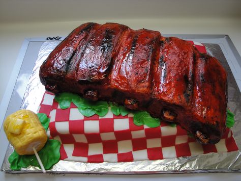 BBQ ribs cake - This was so fun to make! Another cake inspired by fellow CCers. Thanks! Ribs are carved chocolate cake covered with BC and "painted." The sauce was piping gel colored to look like BBQ sauce. I sprinkled crumbled oreos on top to look like pepper. Corn is RKT wrapped in fondant. Food Imposters, Holiday Cake Decorating, Piping Gel, Bbq Cake, Meat Cake, Realistic Cakes, Birthday Bbq, Creative Birthday Cakes, Different Cakes